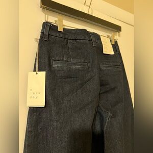 High waisted, stretchy wide leg denim trousers.